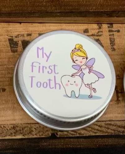 My first tooth tin from sign'd by judy