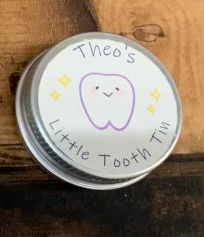 Little tooth tin from sign'd by judy