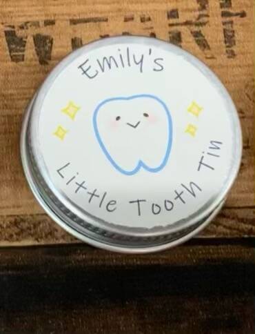 Little tooth tin from sign'd by judy