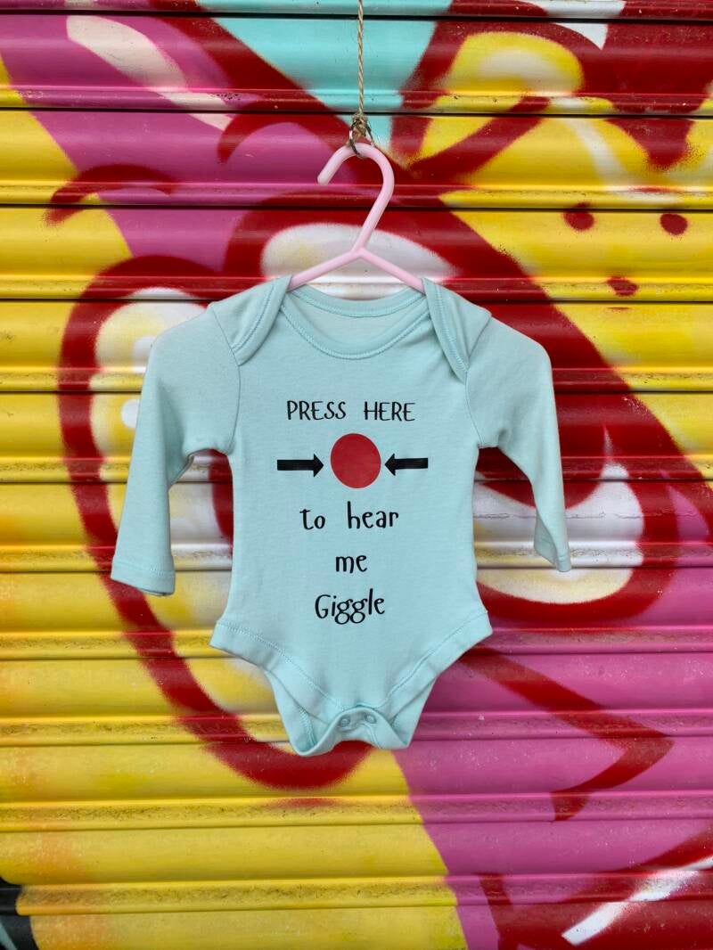 Press here to here me giggle baby vest from sign'd by judy