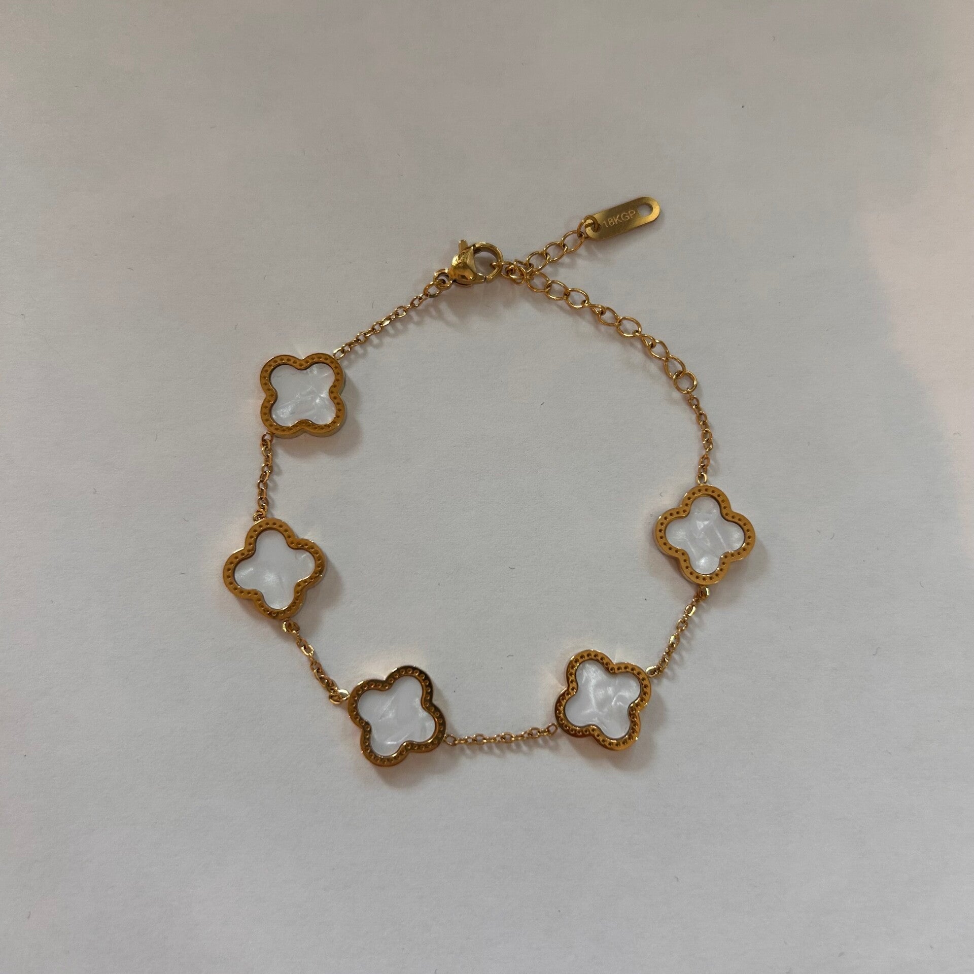 Quadrilateral clover white armband