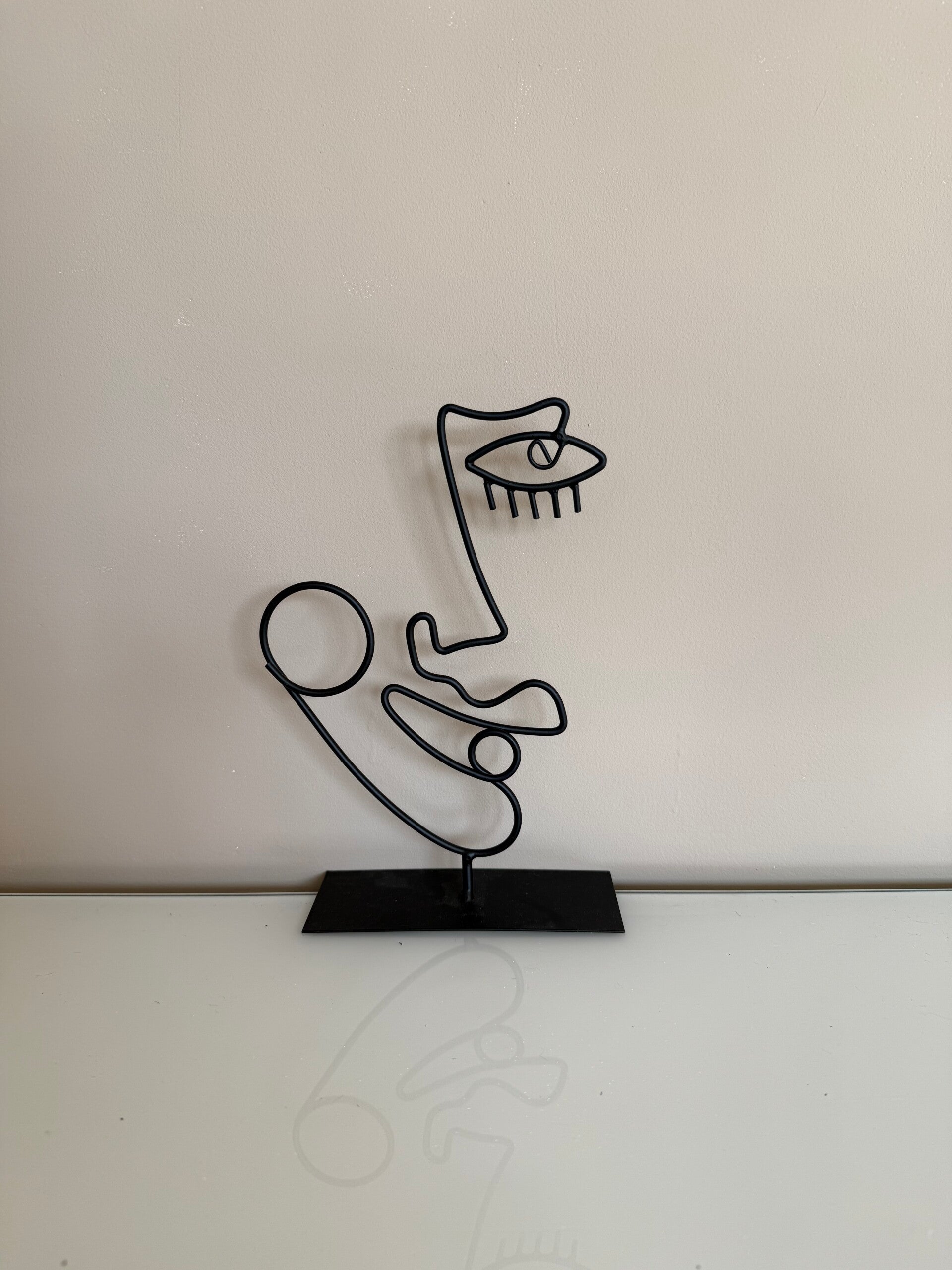 Deco gezicht zwart metaal