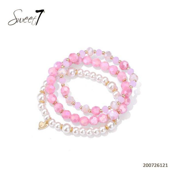 Set armbanden roze/parelmoer wit