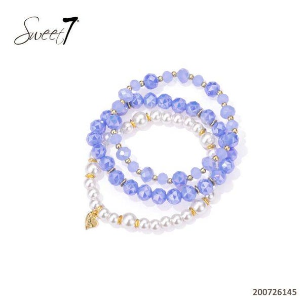 Set van armbanden blauw/parelmoer wit