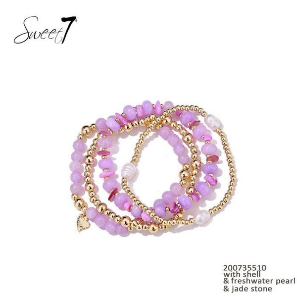 Set van armbanden roze