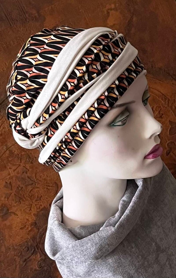 Muts zwart gemêleerd, beige
