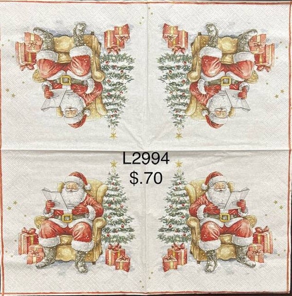 Christmas (L2994) - Santa Sitting on a Chair Reading a Paper