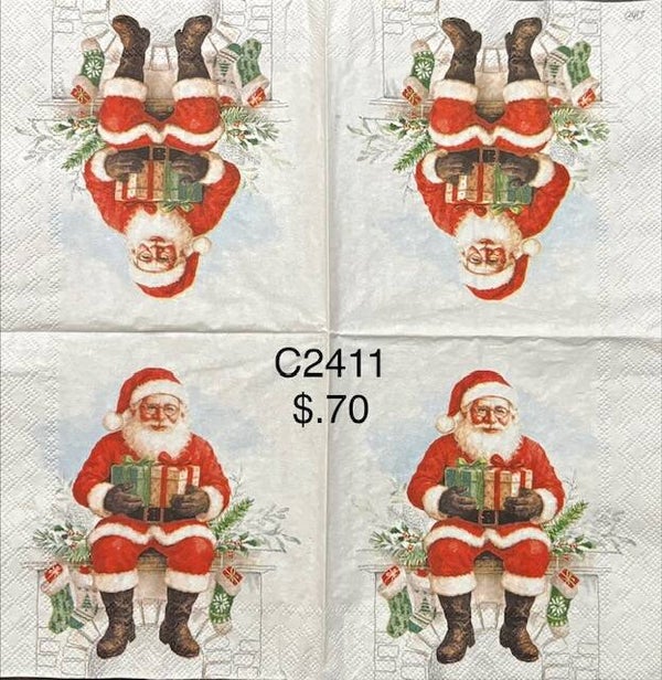 Christmas (C2411) - Santa Sitting on top of Fireplace Holding Presents