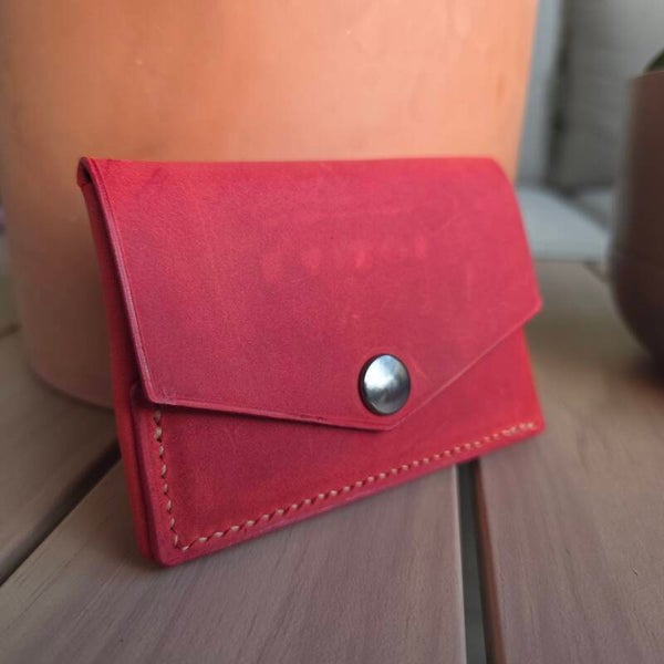 Porte-monnaie plié rouge doux