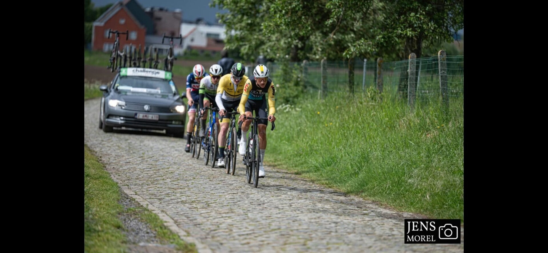 Cyclists riding the cobbled roads of the Flemish Ardennes. Photo: Jens Morel.