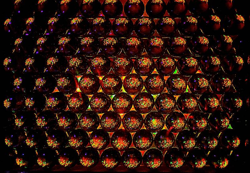 Offset marble matrix screen and LEDs shows analog pixel sized color morphing starlike points of light with some smaller than many single celled organisms.