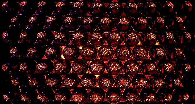 Offset marble matrix screen and LEDs shows analog pixel sized color morphing starlike points of light with some smaller than many single celled organisms.