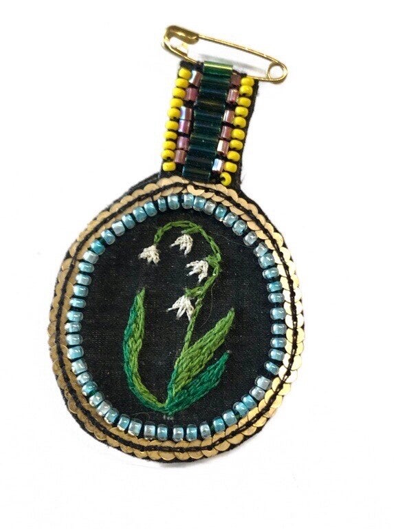 Médaille muguet