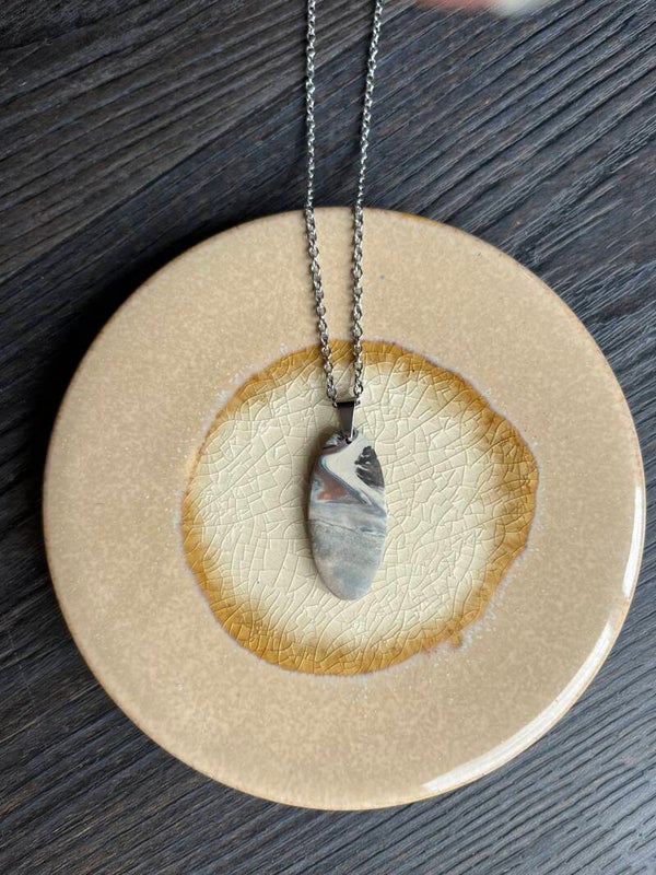 Oval in gray brown necklace