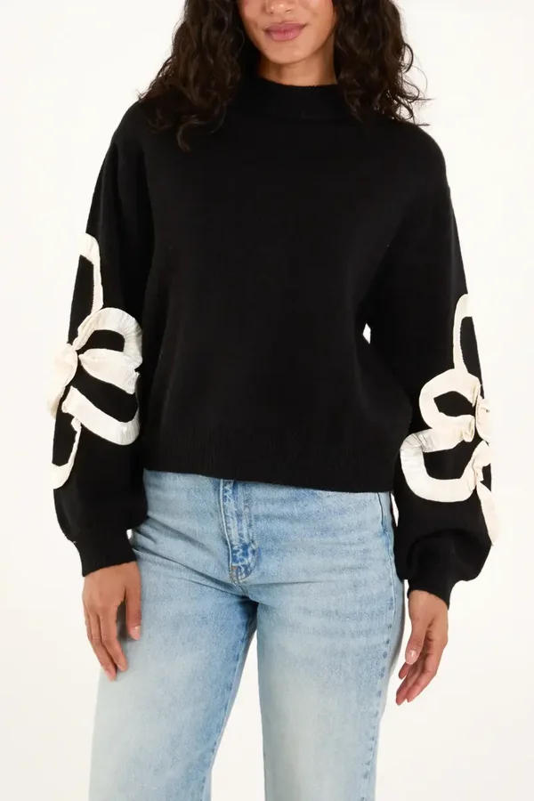 Frilled flower sleeve high neck jumper