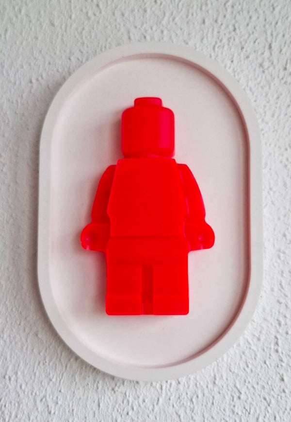 Wandbordje legopoppetje neon roze