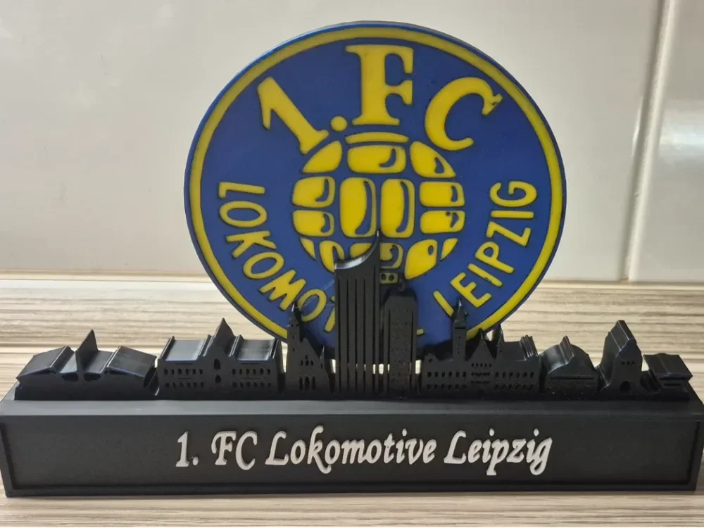 1. FC Lokomotive Leipzig with skyline of Leipzig
