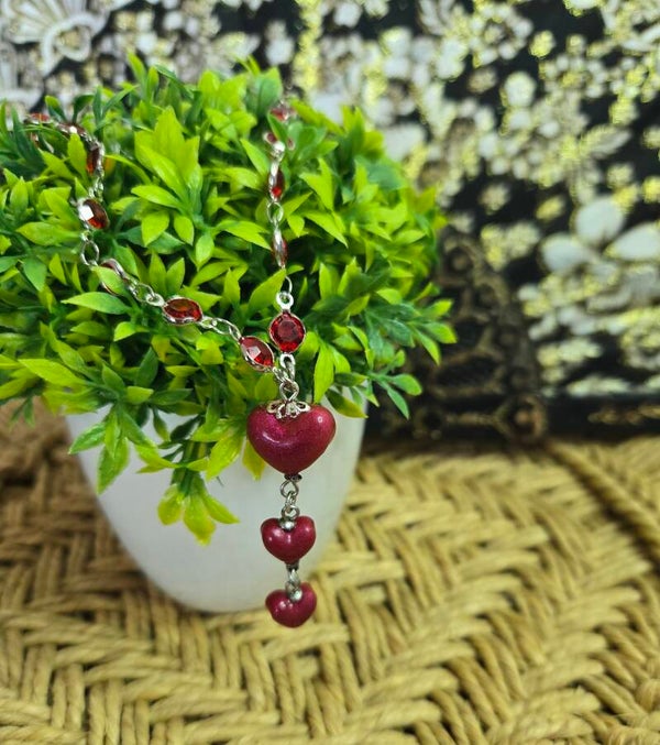Collier "chapelet" cœurs rouges