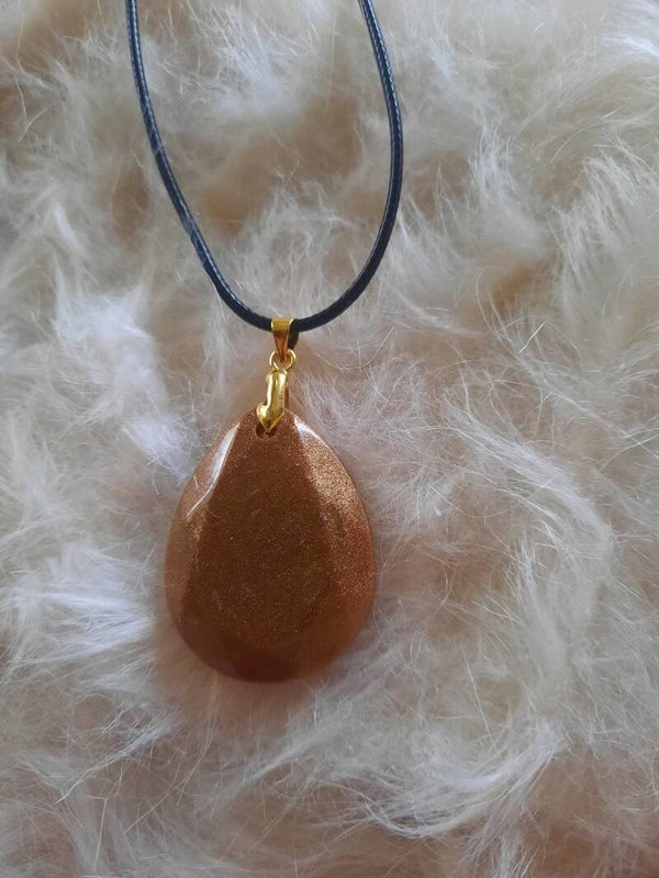 Collier avec pendentif cuivré