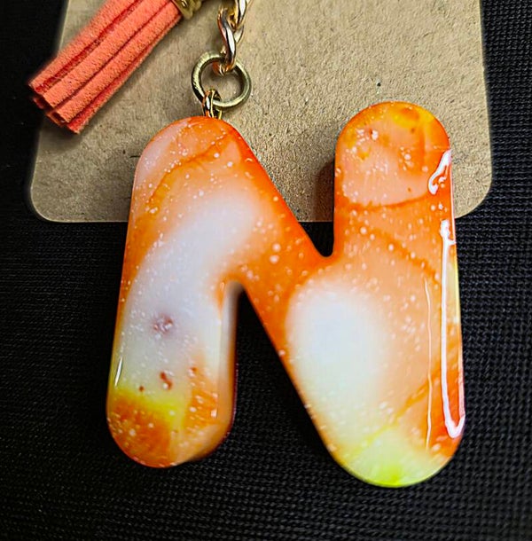 N orange/jaune/blanc