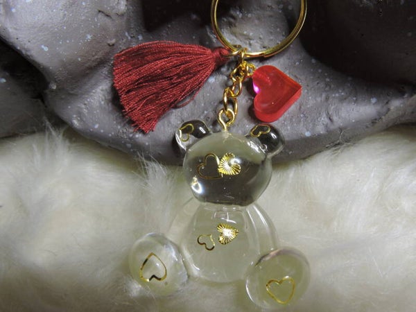 Porte clés ourson transparent avec coeurs dorés