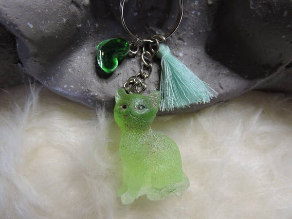 porte clés chat vert translucide