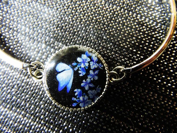 bracelet papillon/fleurs bleus