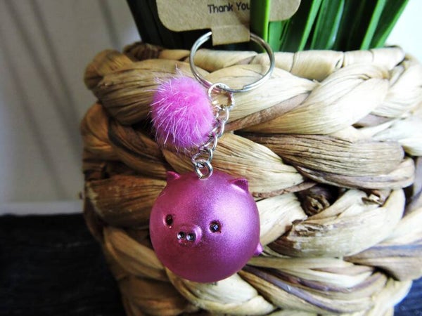 porte clés "z'animobulle" cochon rose