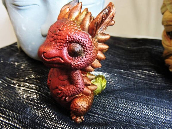 petit dragon rouge/orange et jaune
