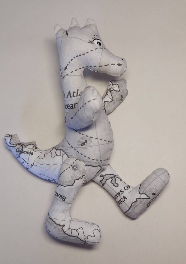 Stoffen Dino "Wereldreiziger"