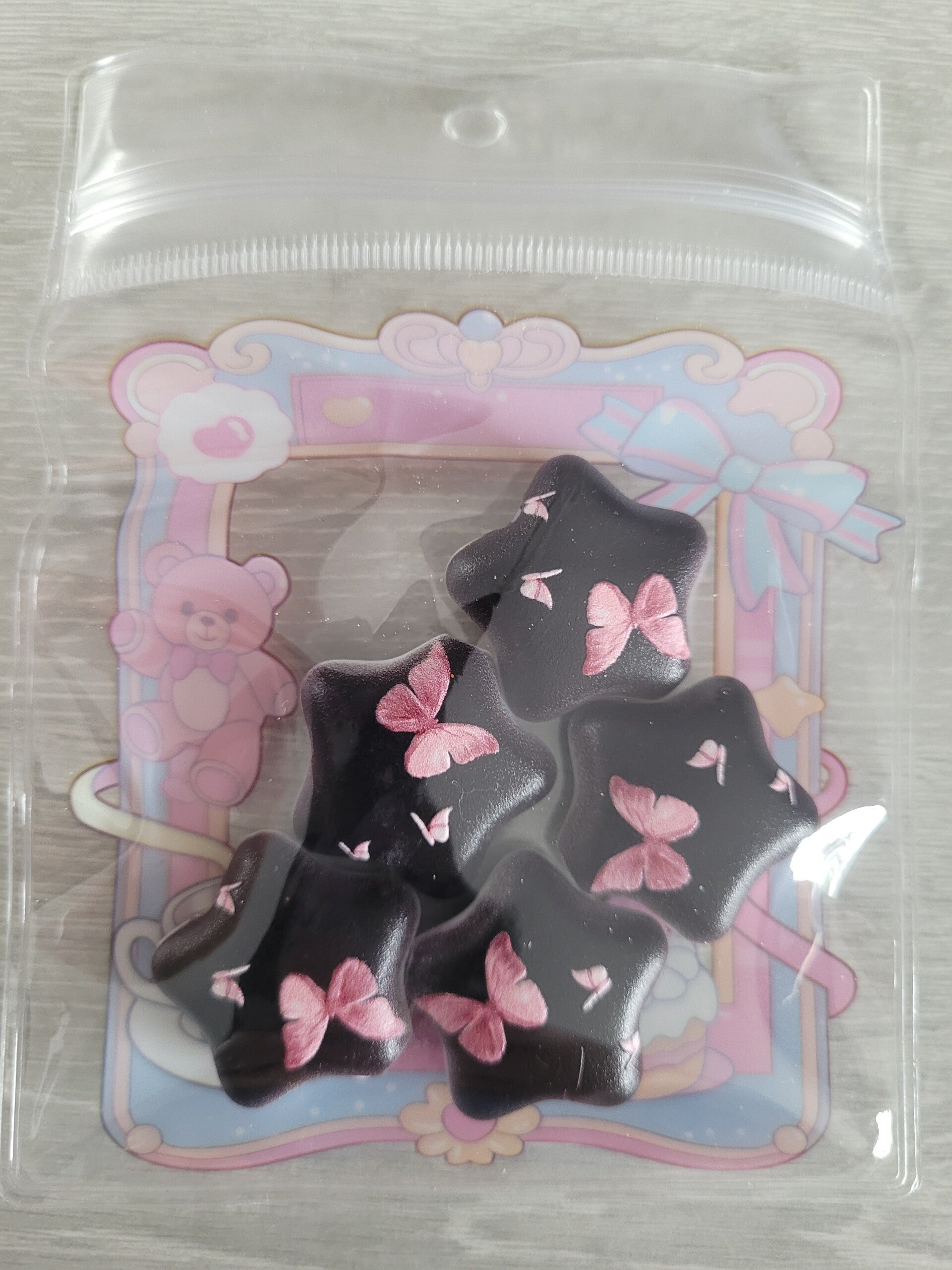 Etoile papillon rose