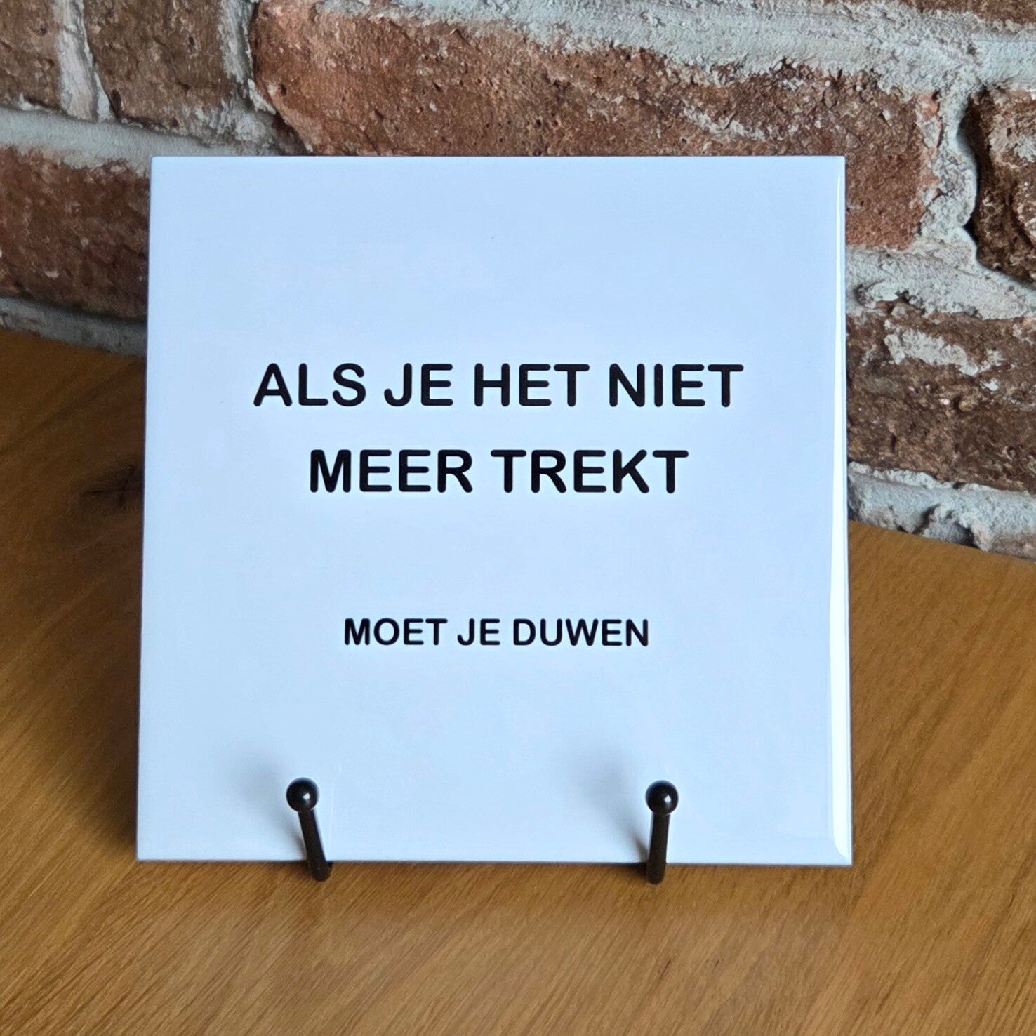 Tegeltje 'als je het niet meer trekt moet je duwen'