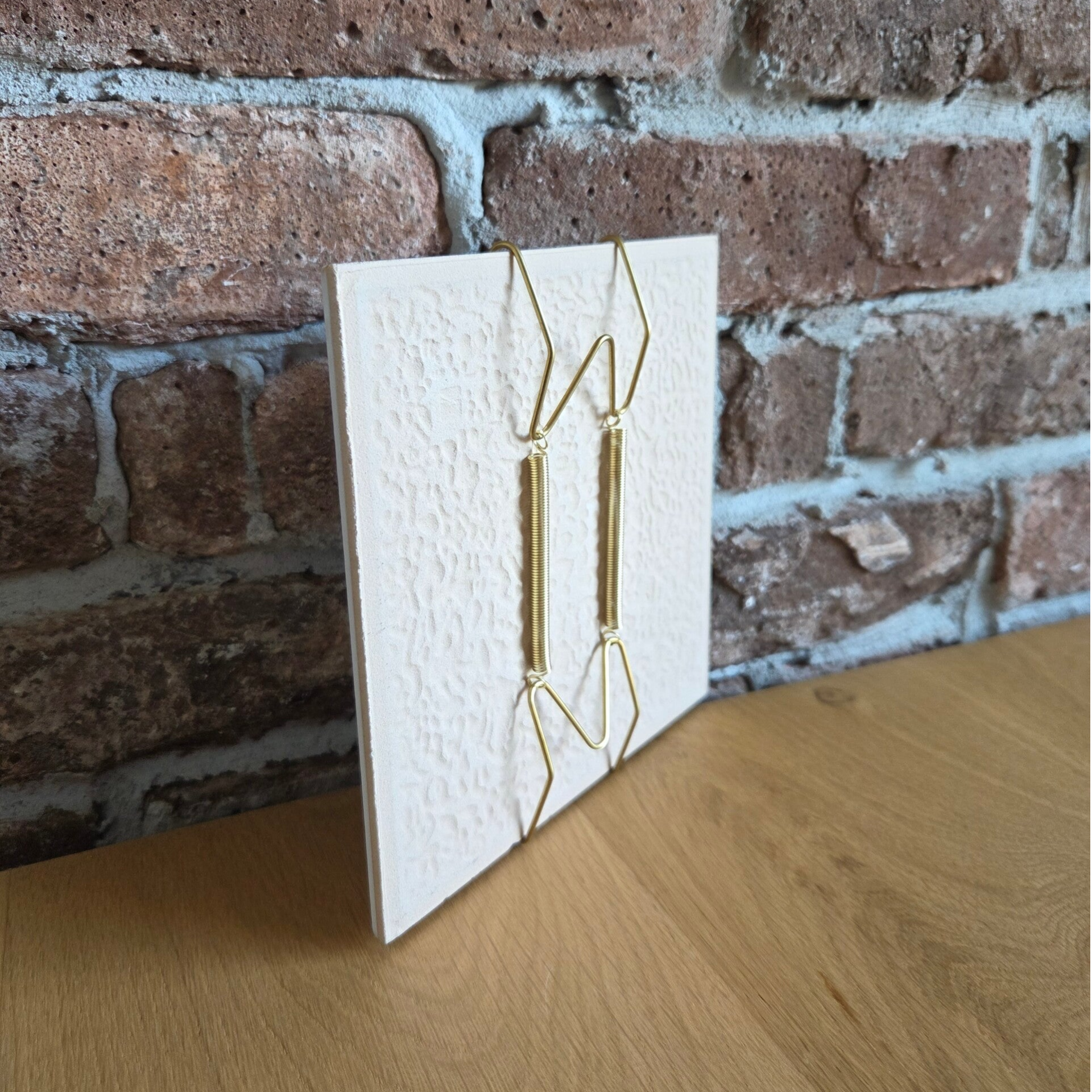 Metalen tegelhanger goud