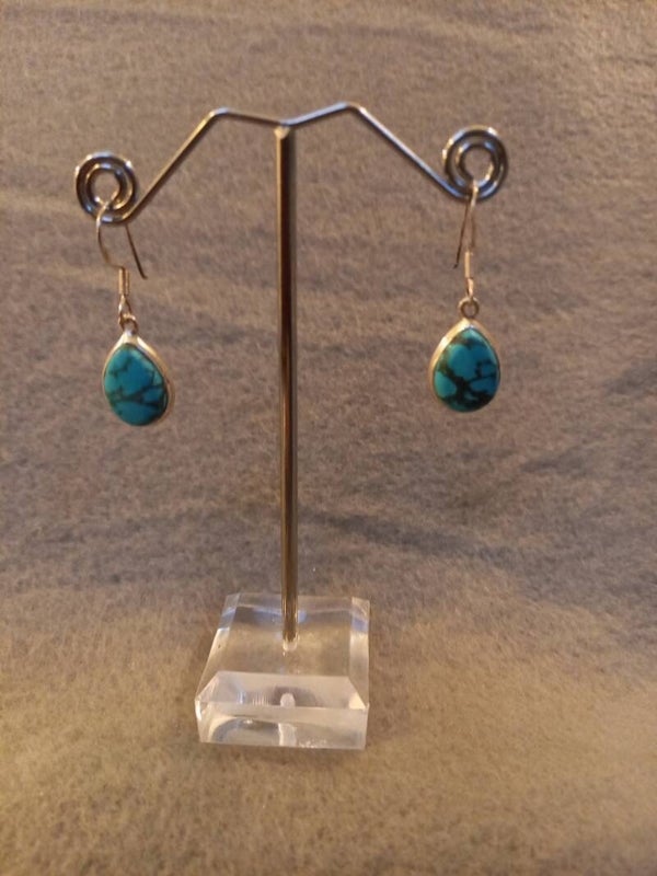 Oorhangers: turquoise druppel in zilver
