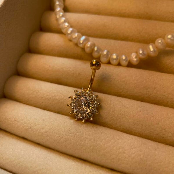 Sunshine Glow Navelpiercing