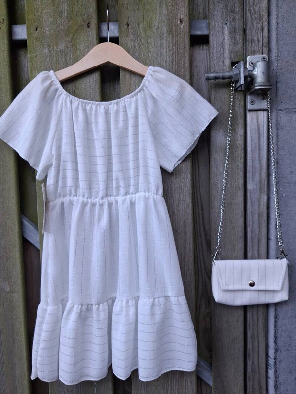 Witte meisjes jurk met zilverdraad