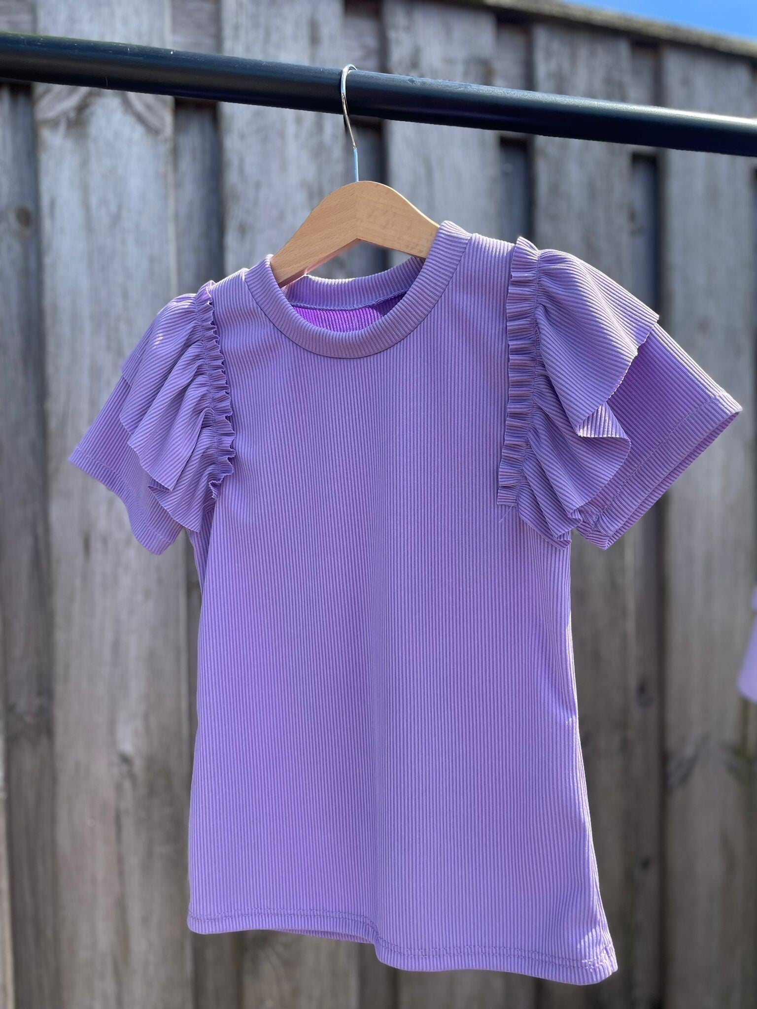 Paars meisjes shirt korte mouw.