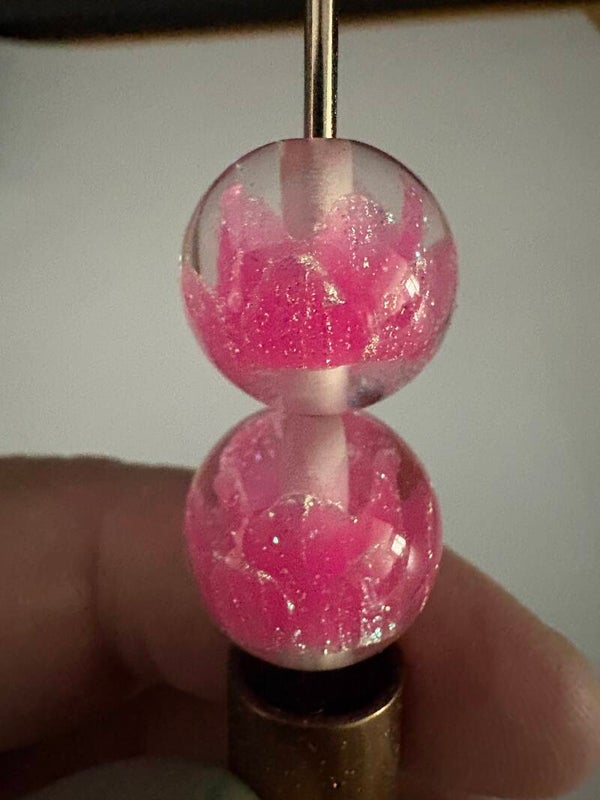 doorzichtige acryl kraal met roze kroon 16 mm