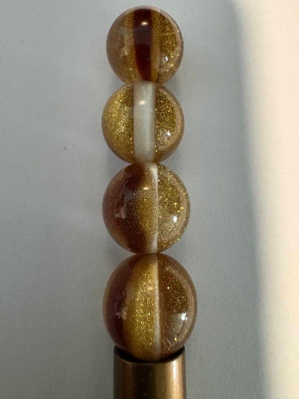 bruin met goud kraal 16 mm