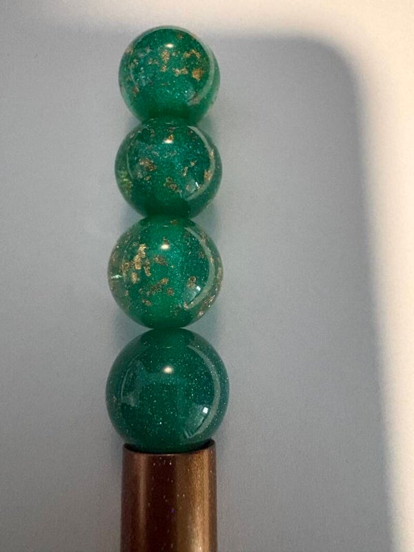 groene met gouden glitter acrylkraal 16 mm
