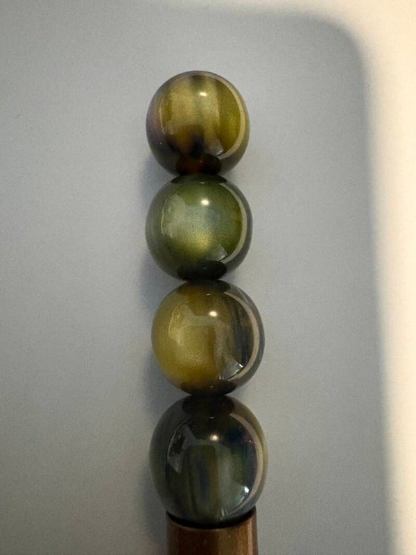 groen cat eye acryl kraal 16 mm