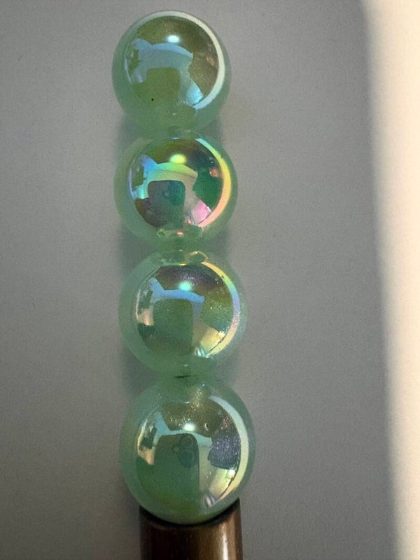 lichtgroene acryl kraal met fijn glitter 16 mm