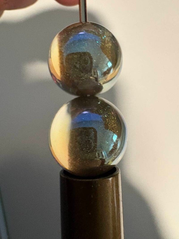 doorschijnende acryl kraal met gouden glitter 16 mm