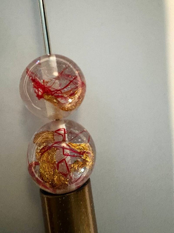 doorzichten acryl kraal met rood en goud
