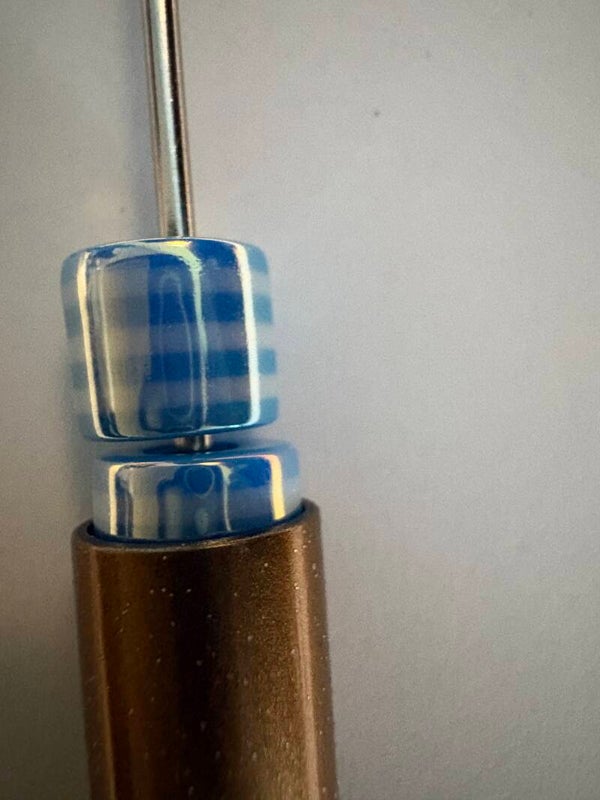 blauwe acryl kraal met licht blauwe strepen 8 mm