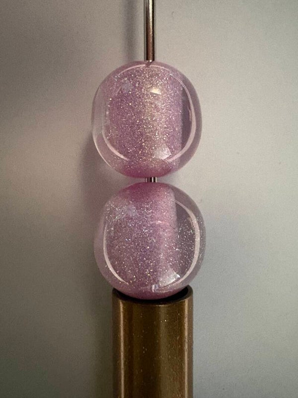 doorzichten paarse acryl kraal met roze glitter 16 mm