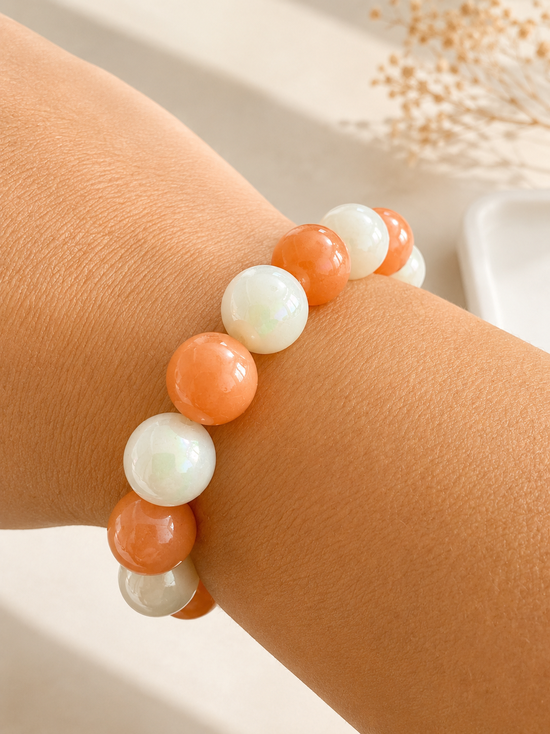 licht orange en wit armband