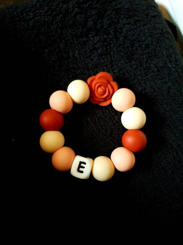 Handgemaakte bijtring met naam