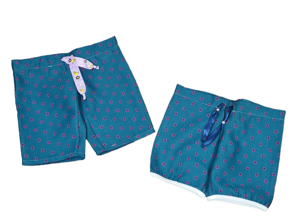 Kurze Grüne Baumwollhose Motiv Lila Blumen 110 - 116