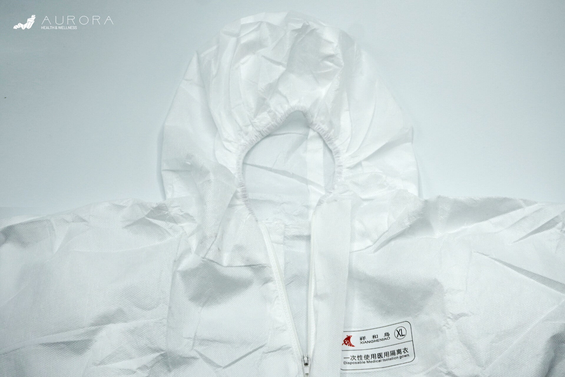 DISPOSABLE PROTECTIVE COVERALL